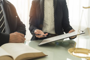 Legal Team Reviewing a Notice to Sue Letter